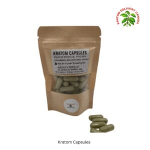 A kraft pouch labelled Kratom Capsules with capsules in front of it on a white background